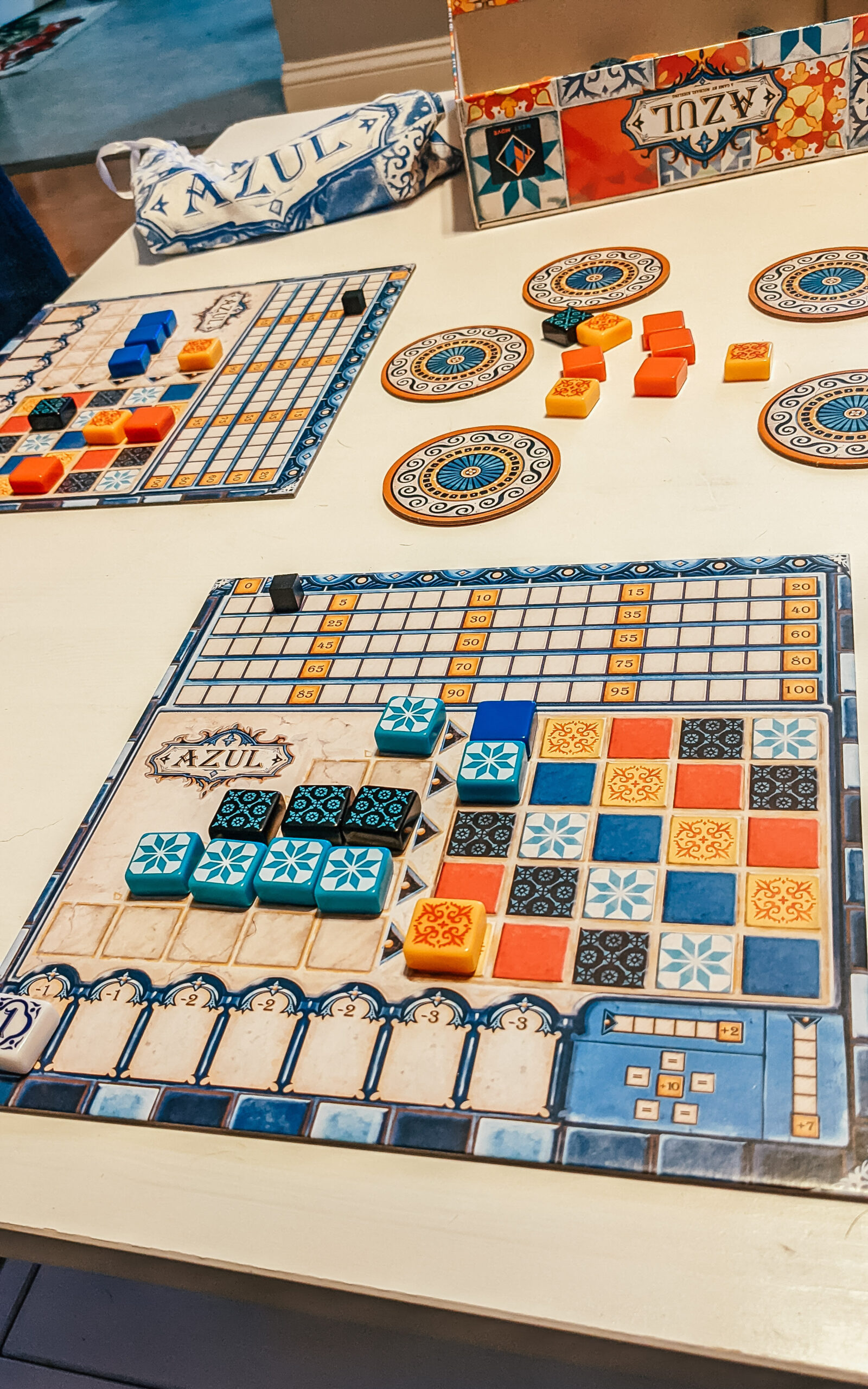 while table with board game Azul
